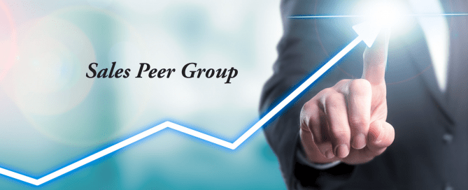 A business person pointing to a line that is projecting upwards