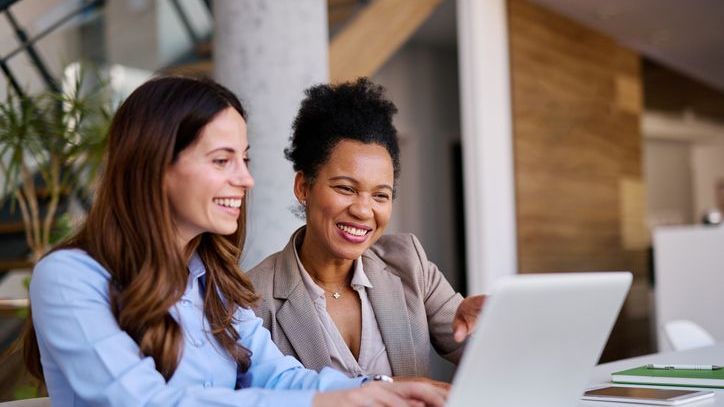 Women technology and business leaders collaborating in a TechConnex peer group